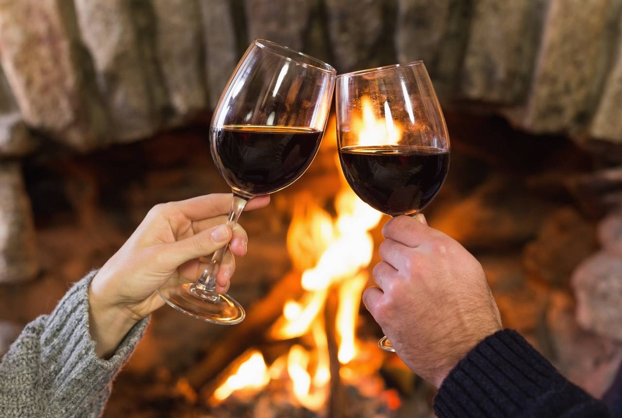 Cozy up by the fire with a glass of wine at Kalaloch Lodge